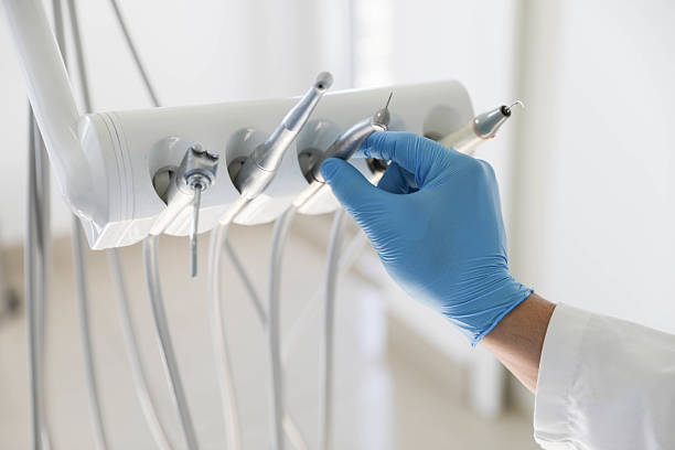 Professional Wisdom Tooth Removal technician working in Sands Point, NY